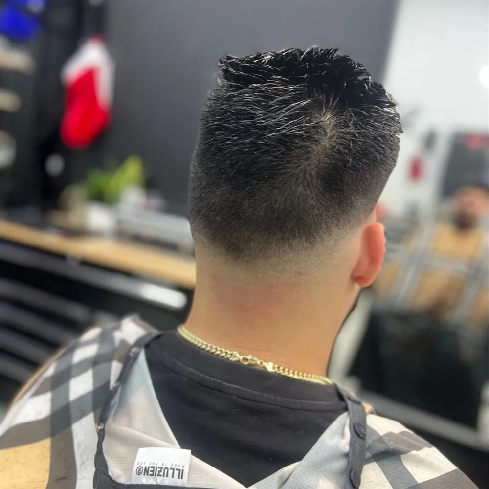 Trabajo real del portafolio de Indio Barber, pieza 13 de 25