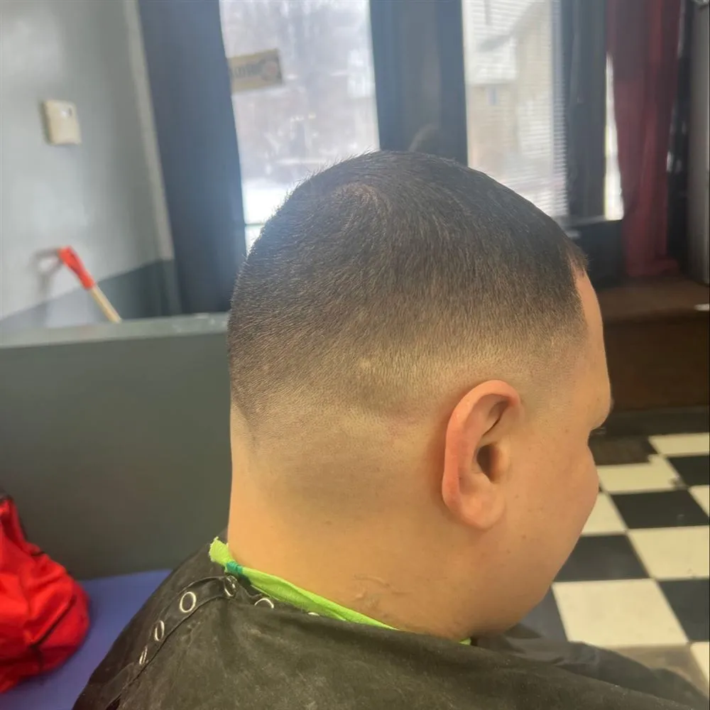 Trabajo real del portafolio de Indio Barber, pieza 20 de 25
